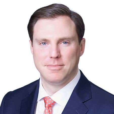 A headshot of Managing Partner and Chief Investment Officer of Fiducient Investment Advisors, Brad Long.